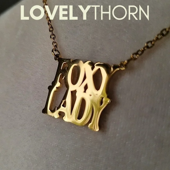 LOVELYTHORN // custom foxy lady 18K gold-plated 16 stainless steel nameplate